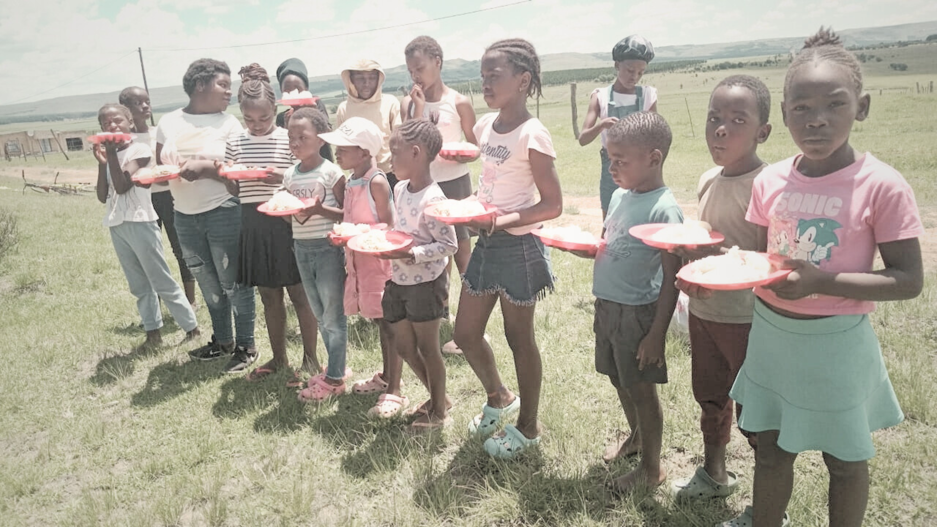 Africa kids getting a war meal